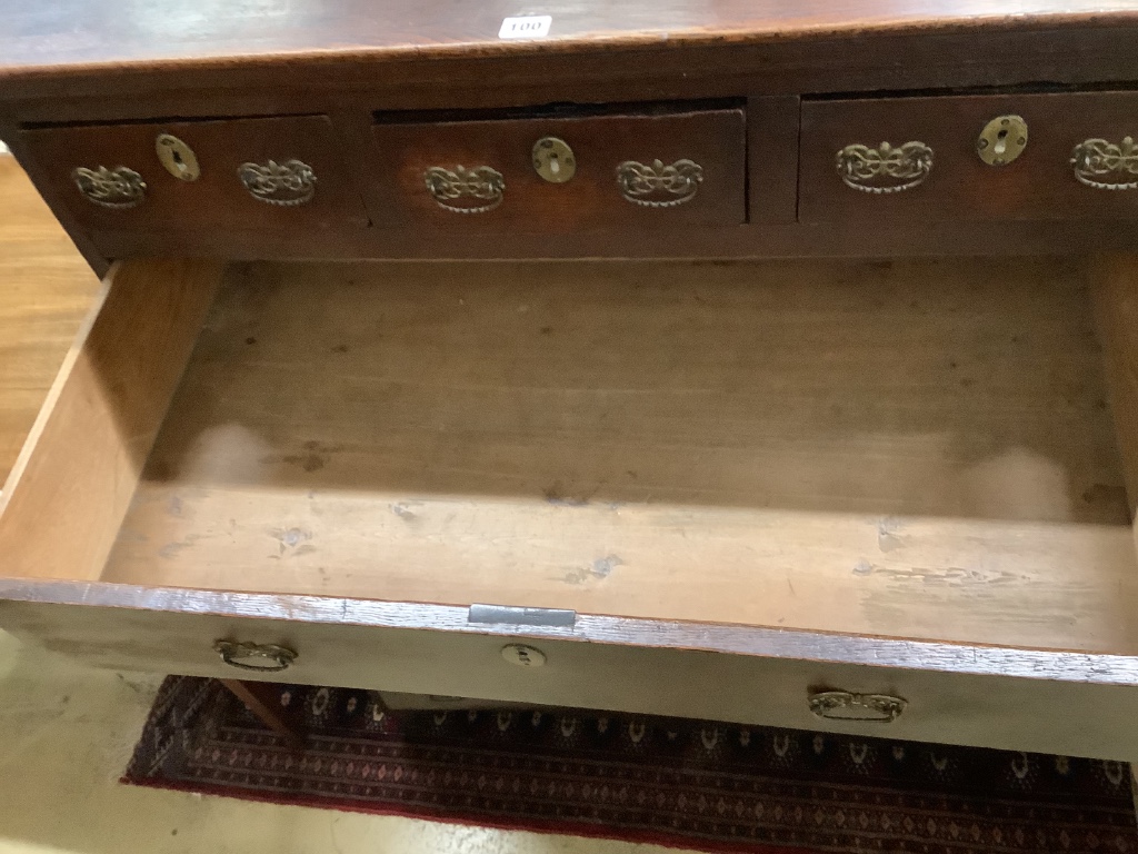 An 18th century oak chest on stand, width 100cm depth 50cm height 129cm